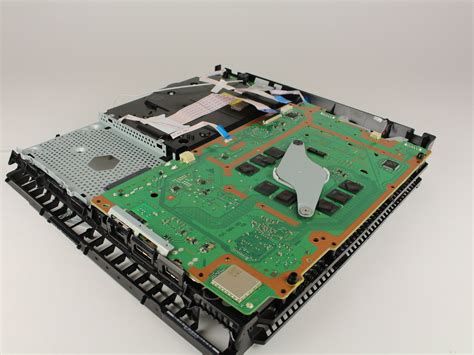 Replace a corroded, damaged, or malfunctioning motherboard and its paired optical drive. . Ps4 motherboard